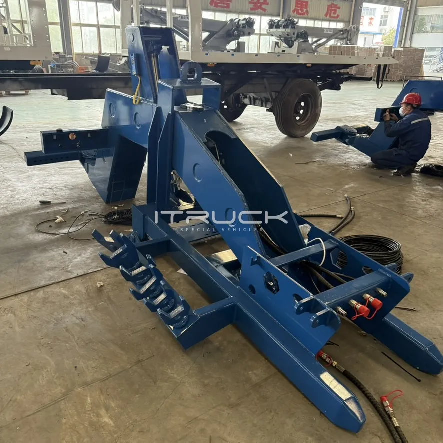 Heavy fifth wheel wrecker frame with fork rack and hydraulic couplings