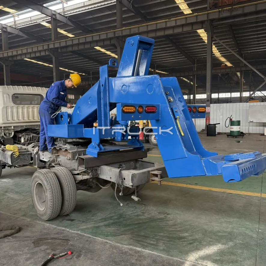 Heavy fifth wheel wrecker coupled to a truck in the workshop