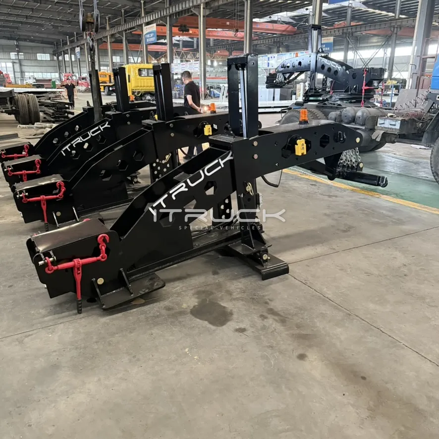 Row of black fifth wheel wreckers on stands in the workshop