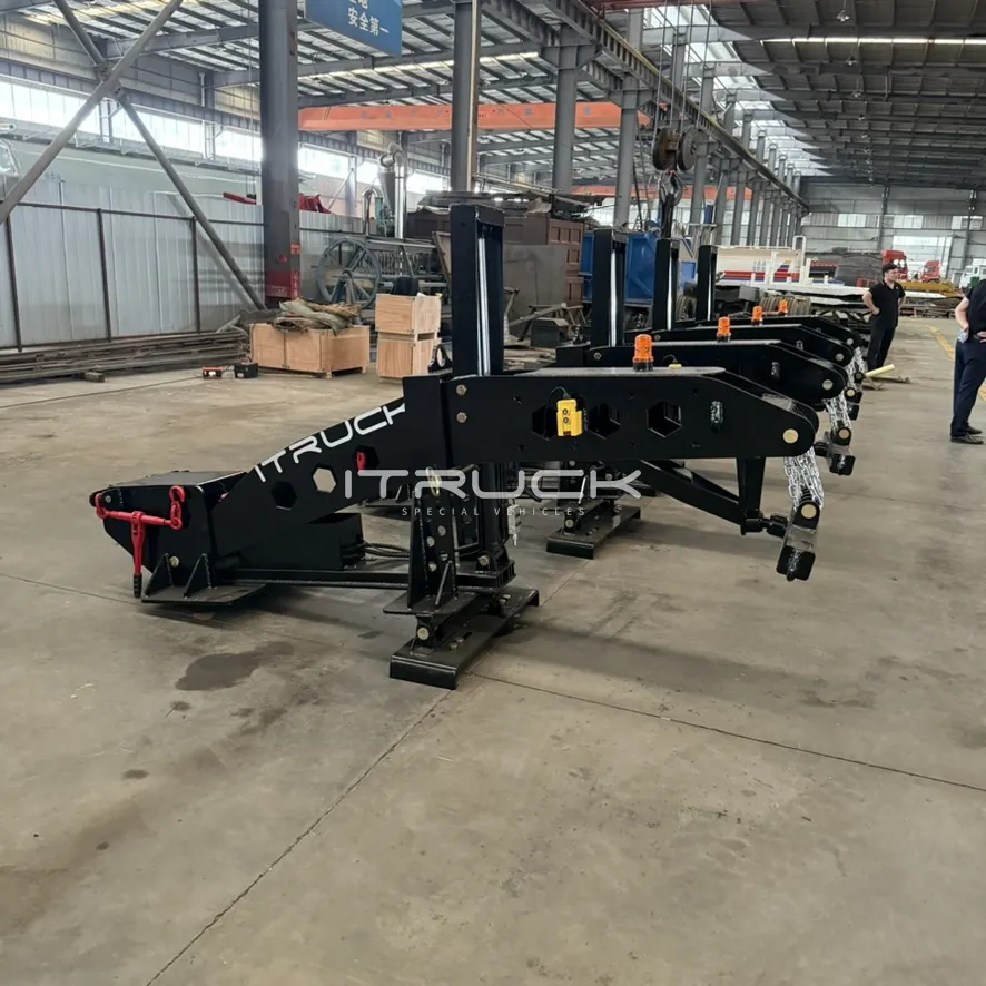 Fifth wheel wreckers lined up on the workshop floor, side view