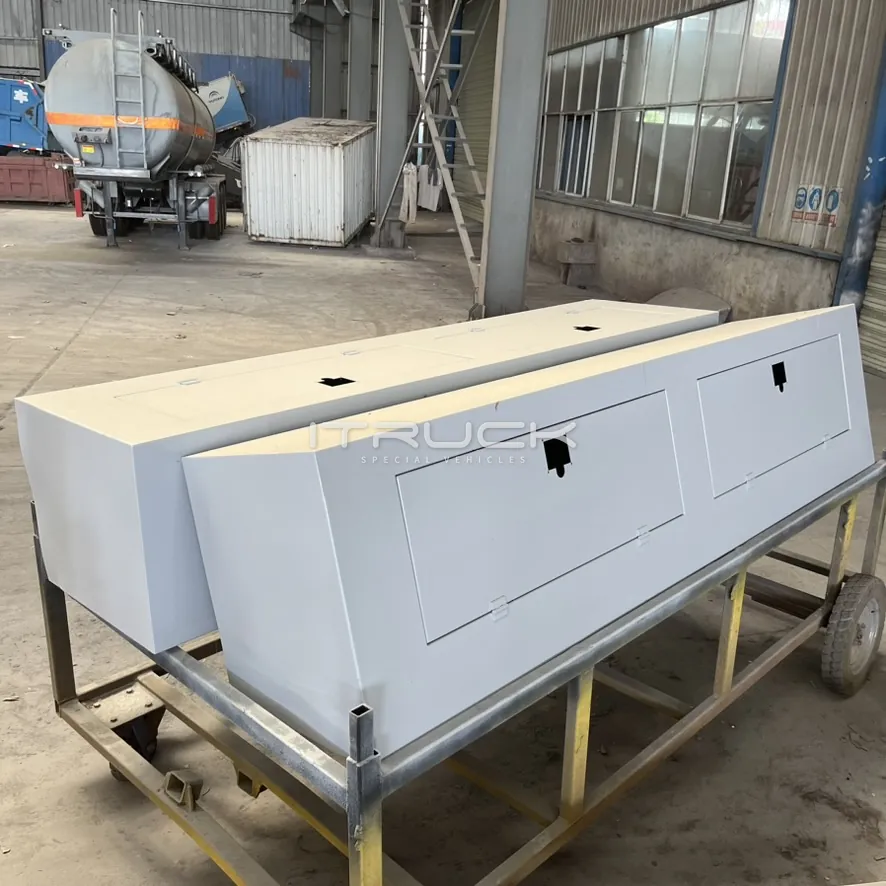 Pair of grey toolboxes on a cart before fitting