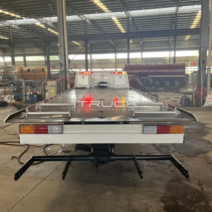 Tilt tray rear light bar and wheel lift arms