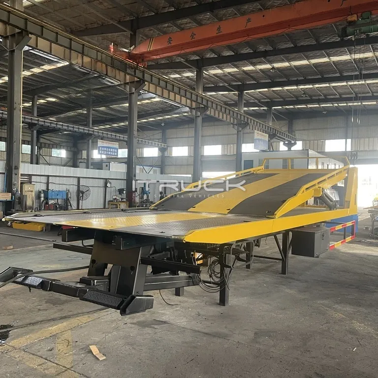 Double deck wrecker body with the upper deck raised