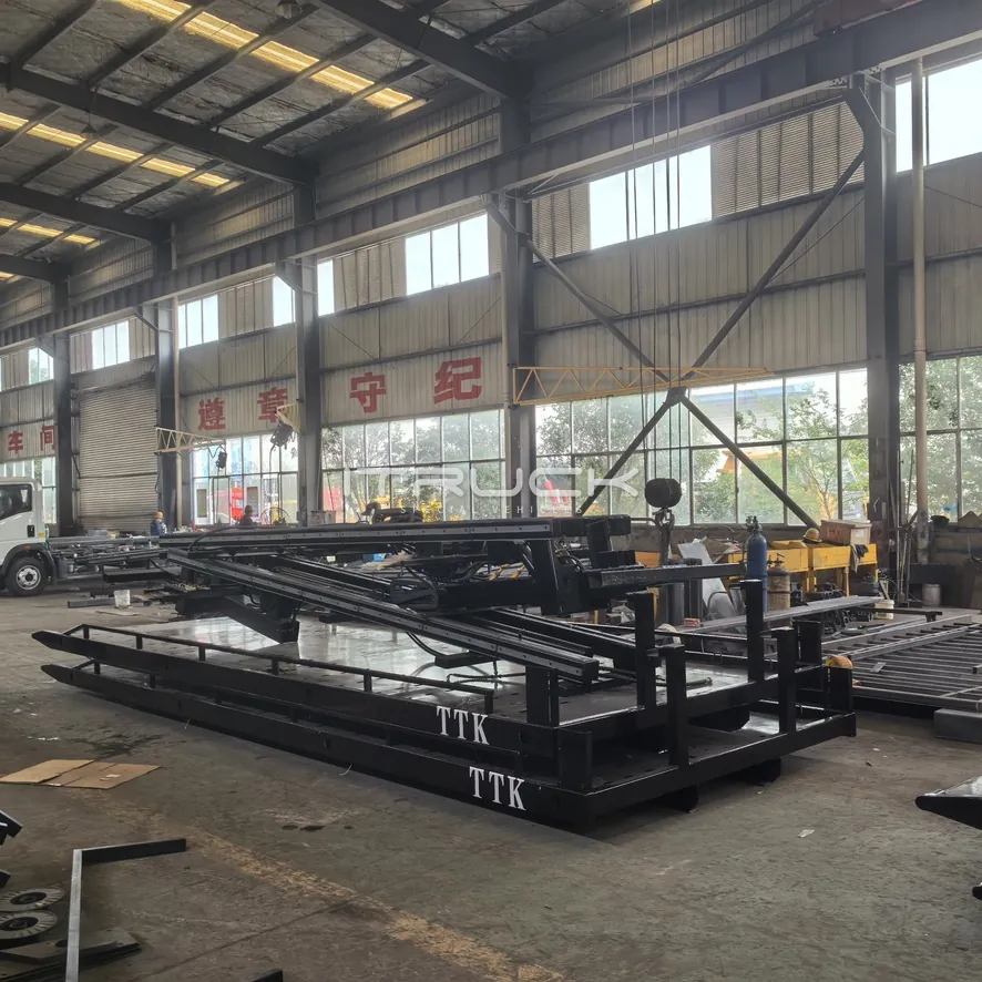 Flatbed decks and subframes ready for loading