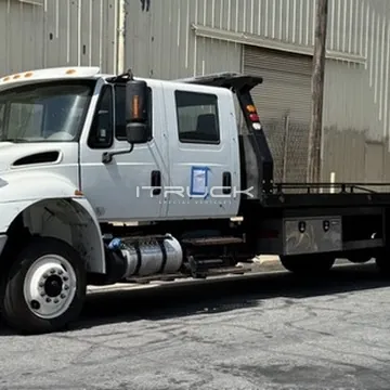 Crew-cab rollback flatbed, road-ready