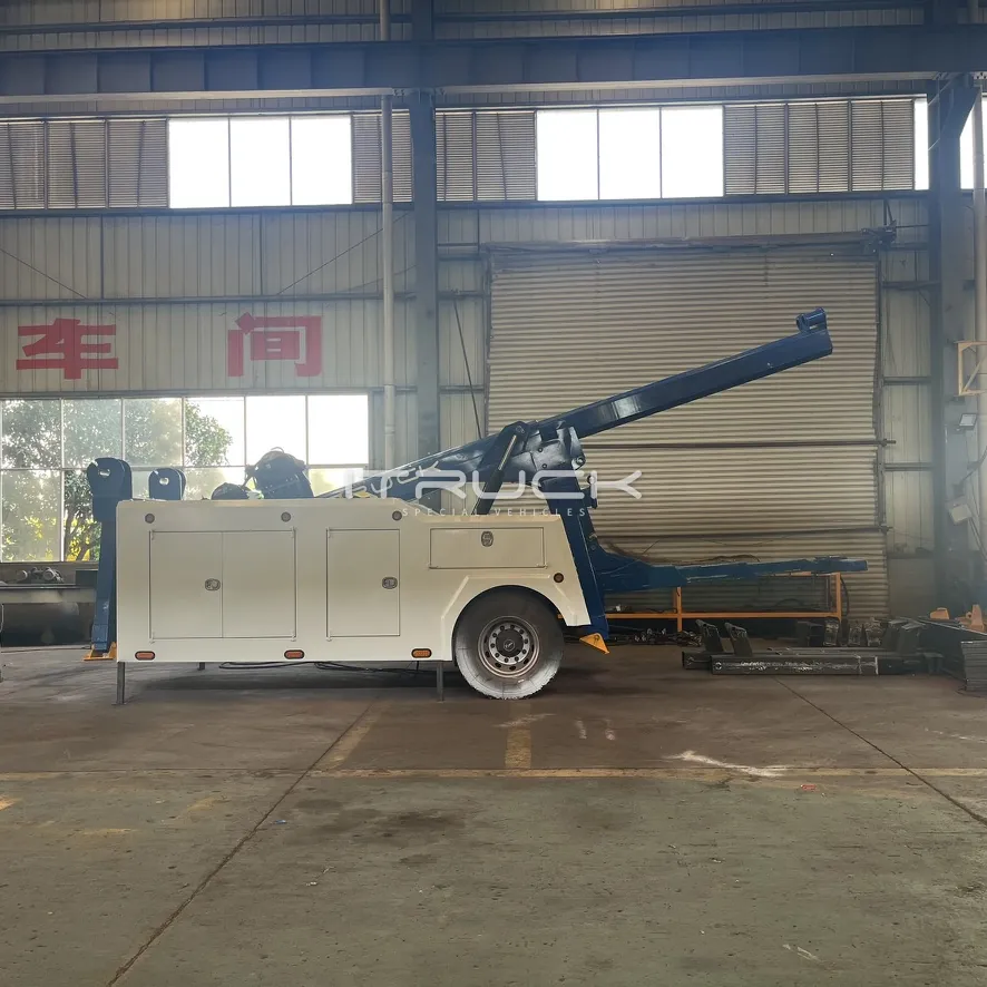 Side view of integrated wrecker body with boom raised