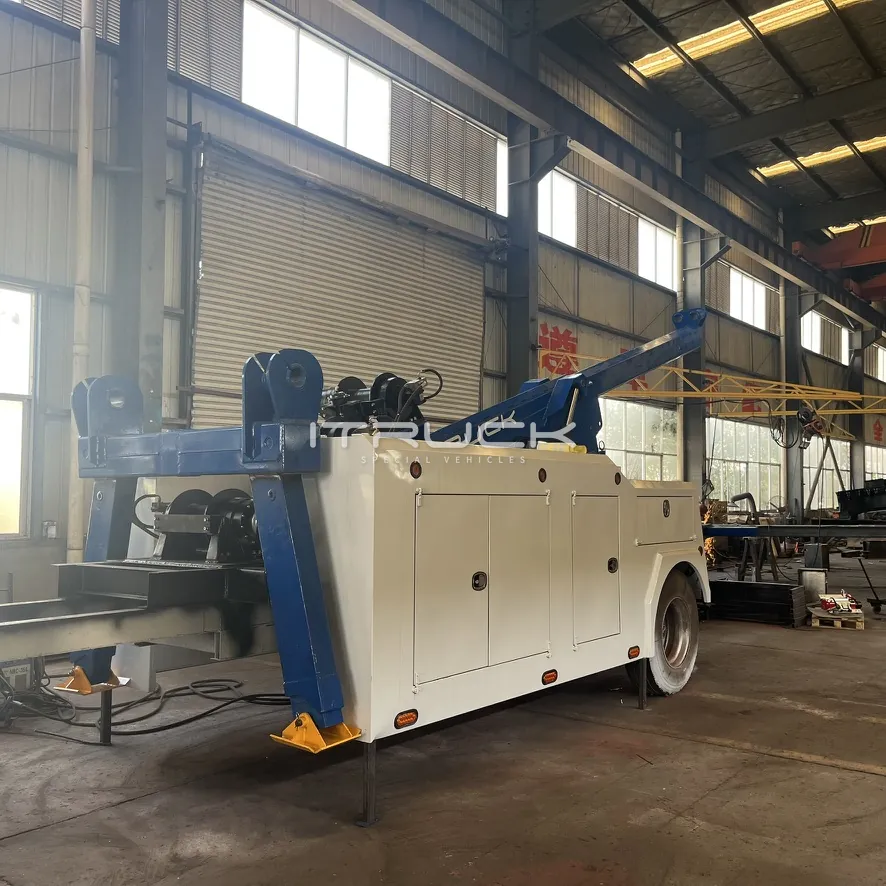 Integrated wrecker body with rear stabilizer legs lowered
