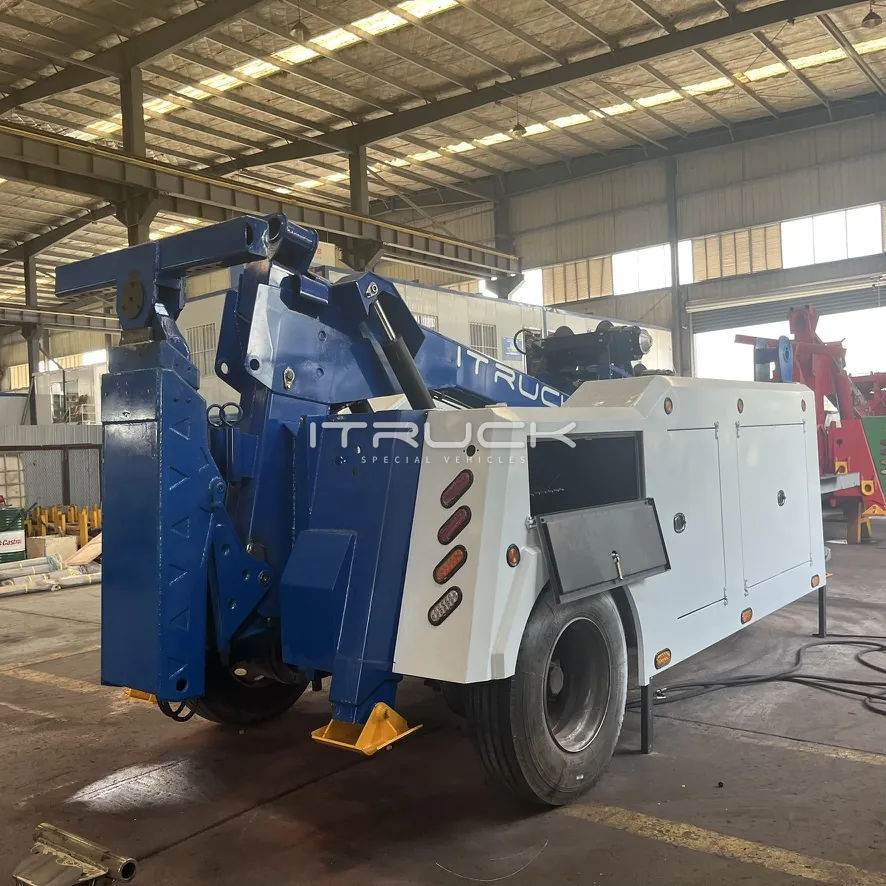 Rear close-up of boom base, stowed underlift and stabilizer legs