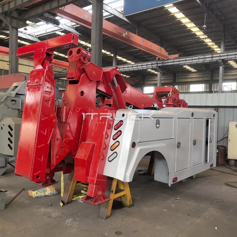 Red boom and underlift assembly with body panels during build