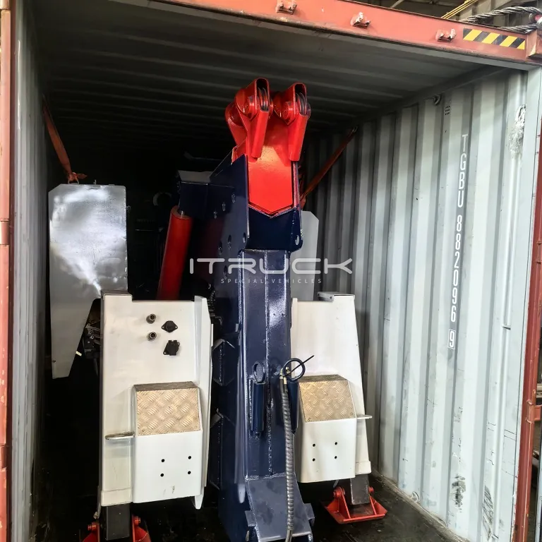 Integrated wrecker body loaded in a shipping container