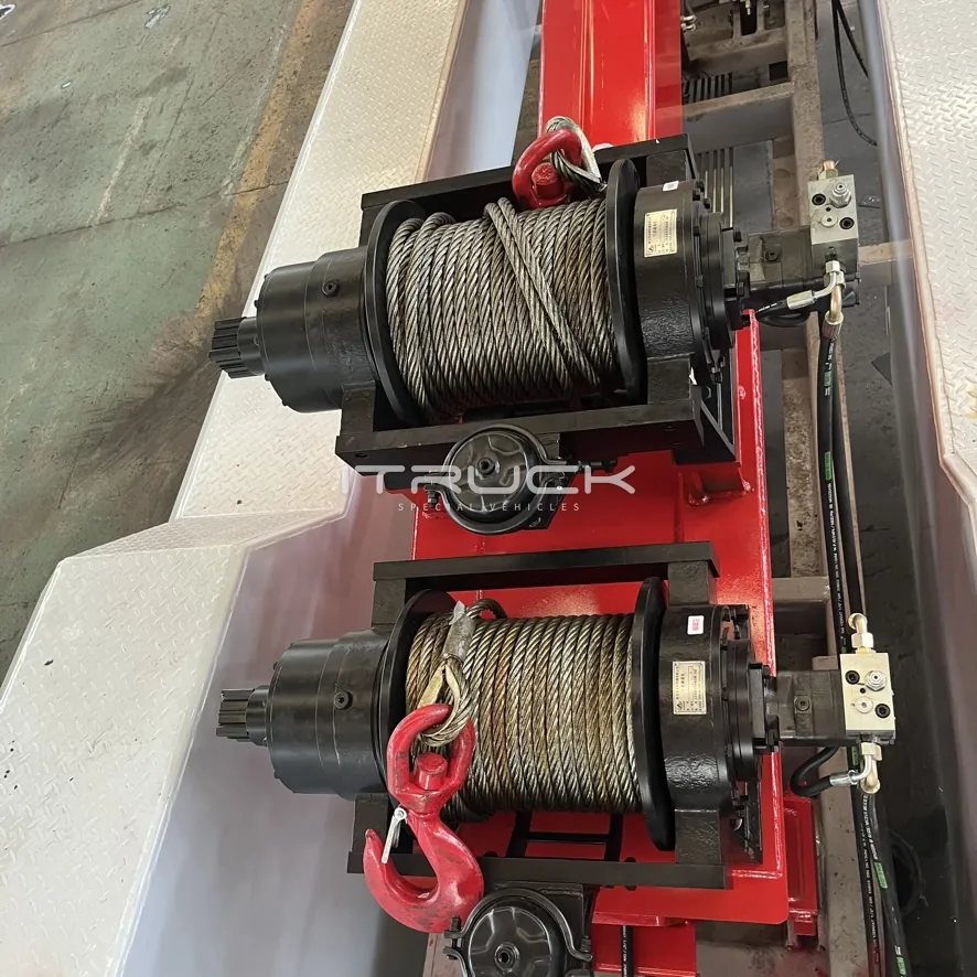 Twin planetary main winches with wire rope mounted on the boom