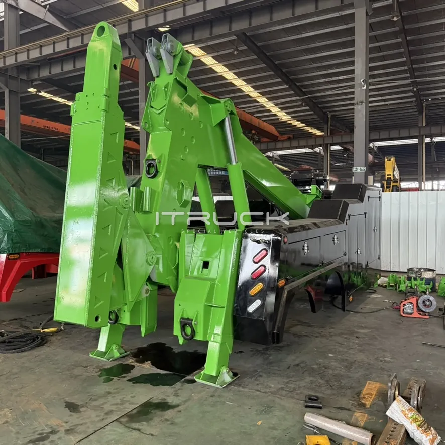 Green boom and underlift assembly on the chassis during build
