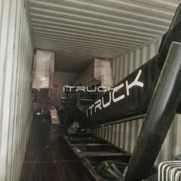 Heavy wrecker boom and body loaded in a shipping container