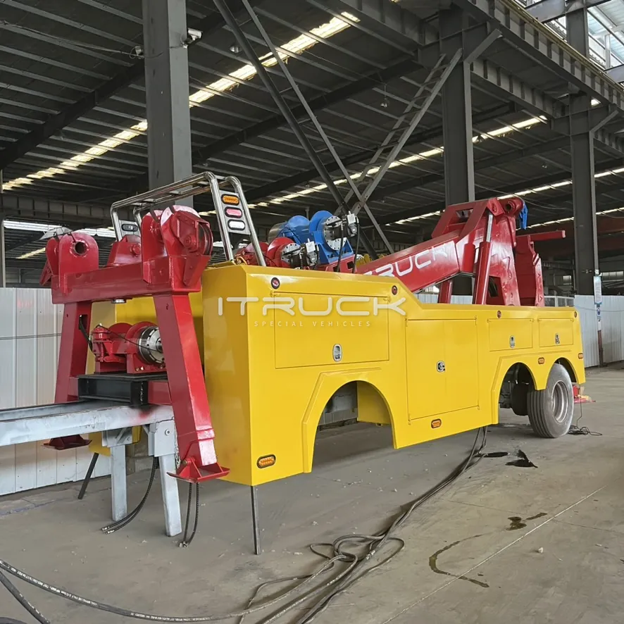 Yellow and red heavy wrecker body from the rear quarter