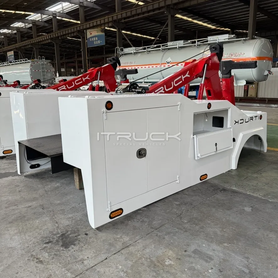 6T integrated wrecker bodies lined up in the workshop