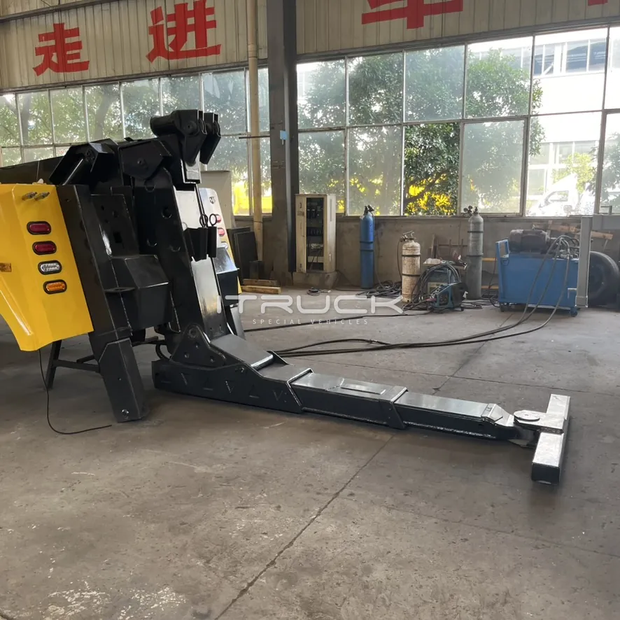 3-stage underlift fully extended behind the wrecker body
