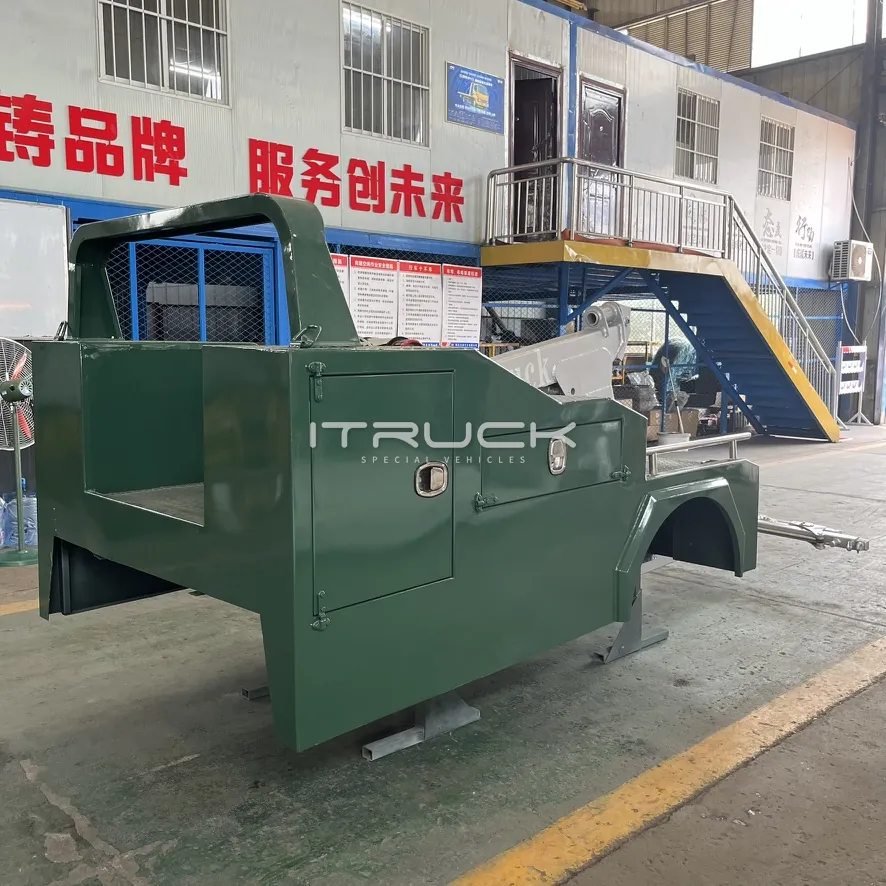 Mini wrecker body side view with steel toolbox doors