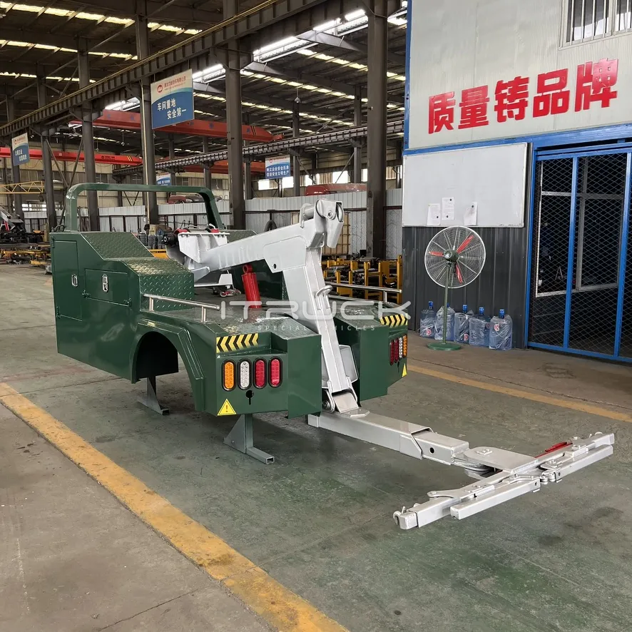Mini integrated wrecker body with underlift and wheel grids deployed