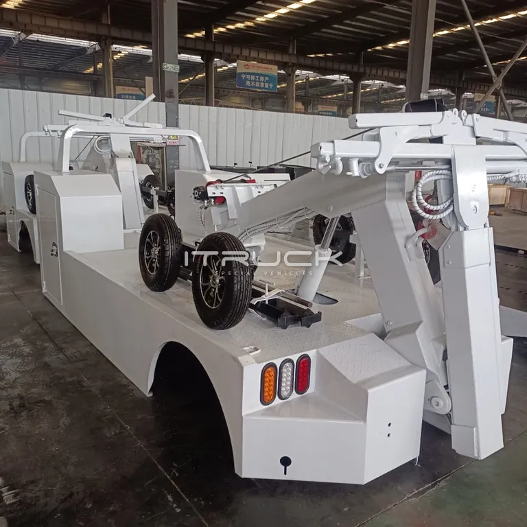 White mini wrecker body with boom and support wheels