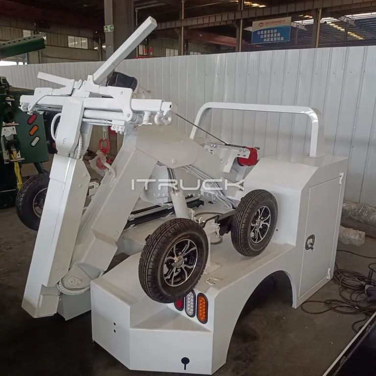 White mini wrecker body rear quarter with support wheels stowed