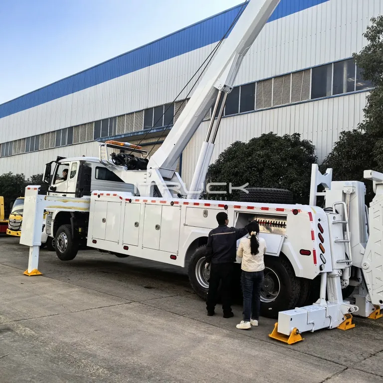 Rotator boom raised high with rear outriggers spread on the ground