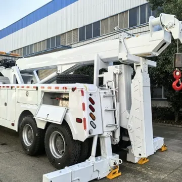Rear quarter of rotator showing raised boom, hooks and underlift