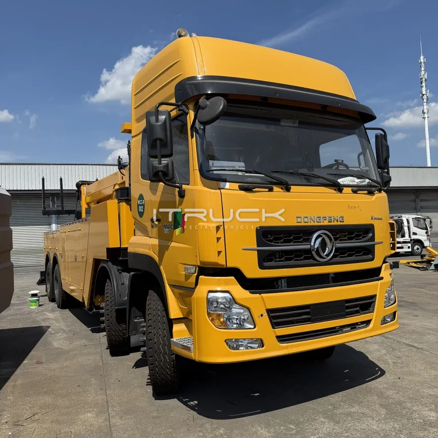 Yellow heavy rotator wrecker on an eight-wheel chassis, front view