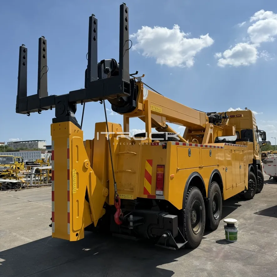 Rear quarter of yellow rotator showing boom, outriggers and underlift