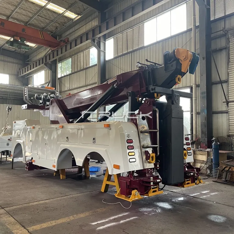 50 ton rotator body in the workshop with boom and rear outriggers