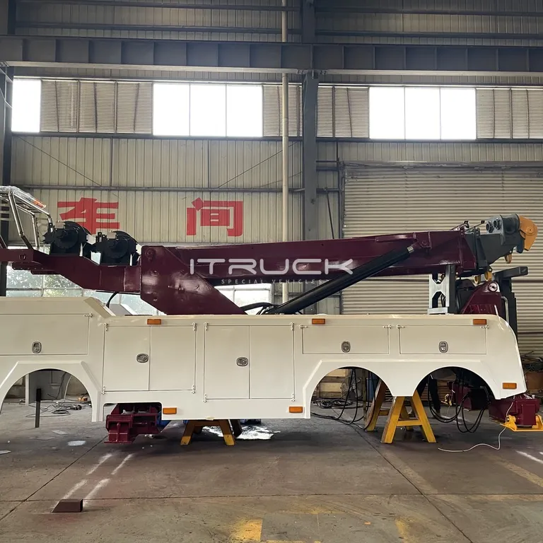 Side view of the rotator body with boom and toolboxes