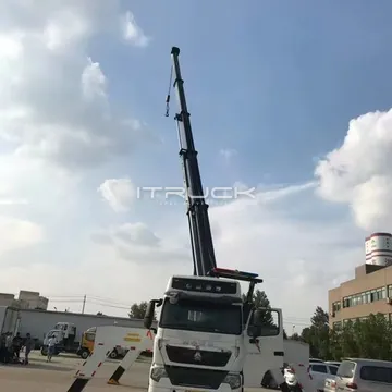 Front view of rotator with boom vertical and all outriggers spread