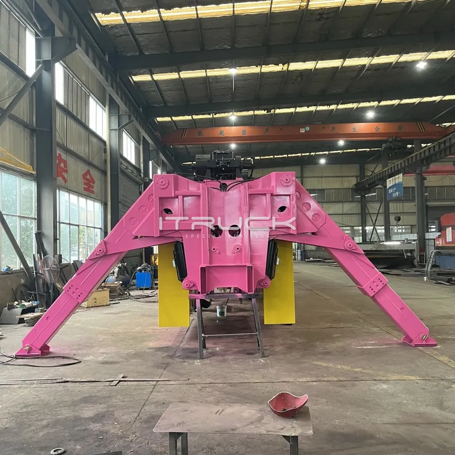 Front of the rotator turret with outrigger legs spread wide