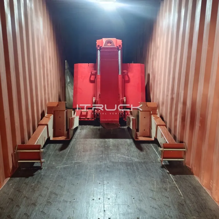 Underlift assembly loaded in a shipping container, front view